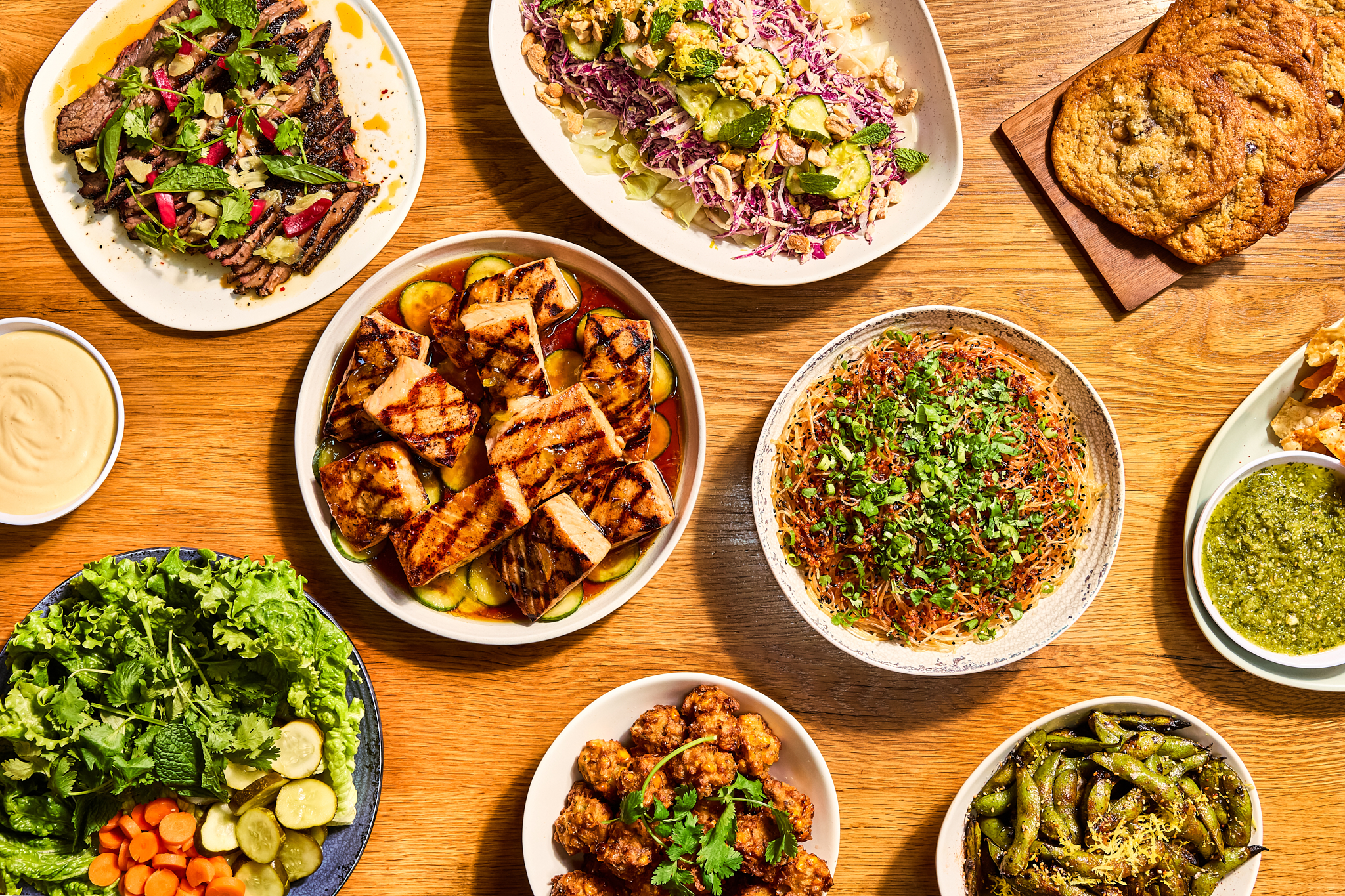 salmon, edamame, lettuce wraps for family style catering from loro