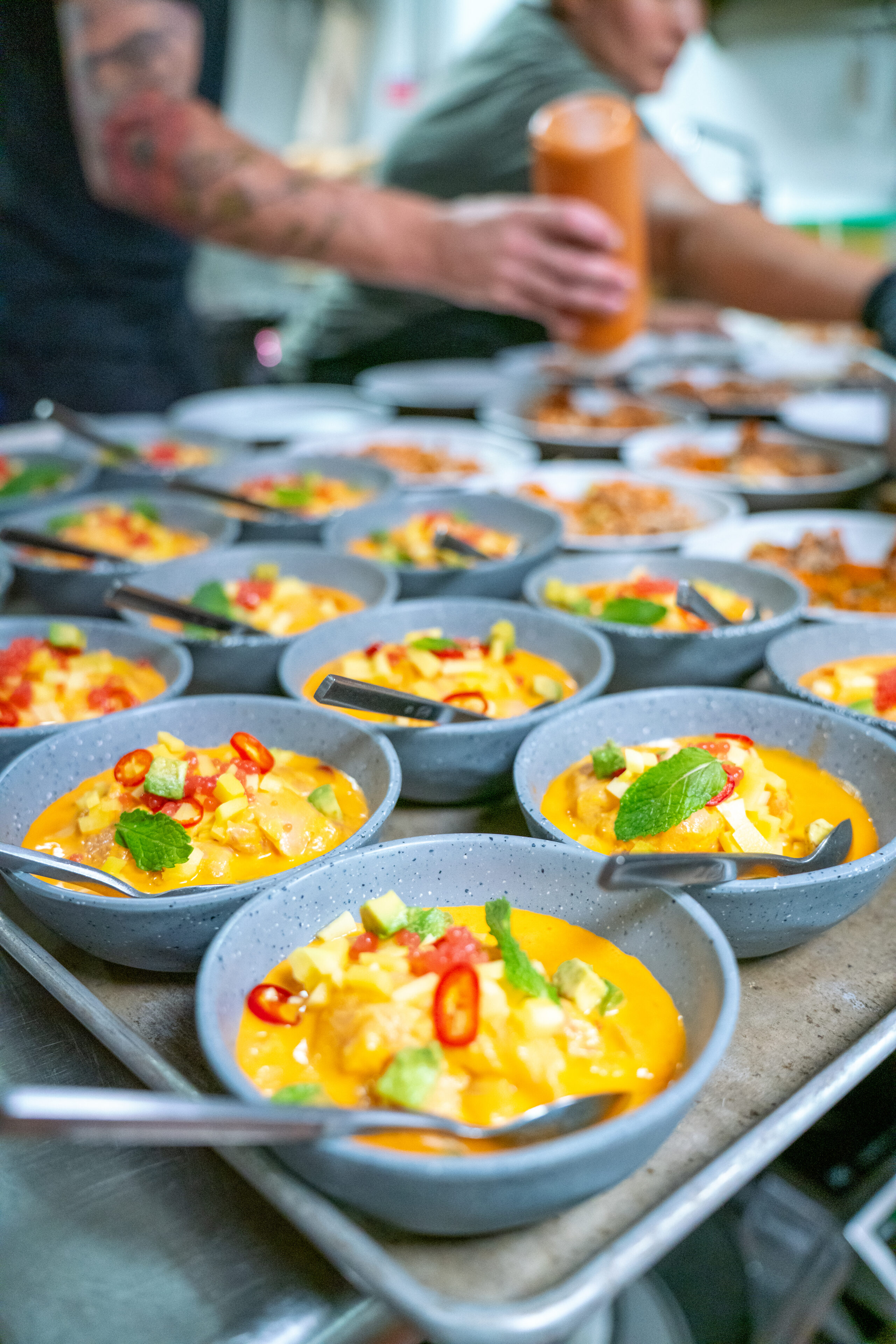 chef plating dishes for a catering event