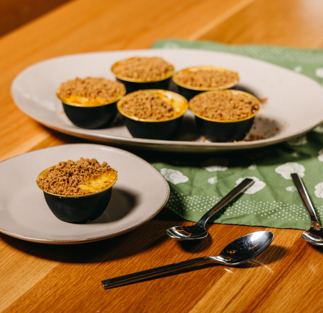 6 mini cheesecakes on a plate